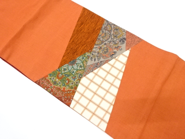 手織り紬　切りばめ　花更紗模様織り出し袋帯